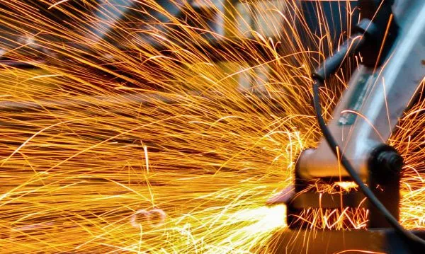 Custom stainless-steel industrial equipment in a production environment